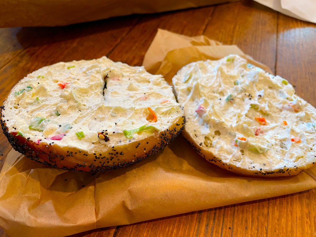 Veggie schmear on poppy seed bagel